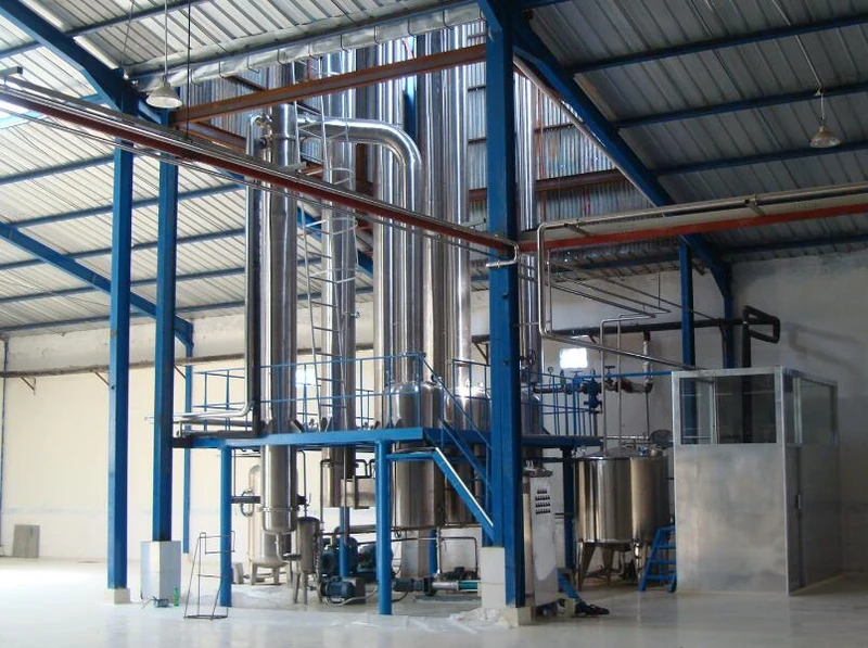 Zhongbo multi-effect falling film evaporator system with vertical stainless steel tubes, separators, and CIP piping in factory installation